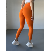 Спортивні лосини жіночі з подвійним Push up та V-подібним швом Оранжевий Спортивні лосини жіночі з подвійним Push up та V-подібним швом Оранжевий